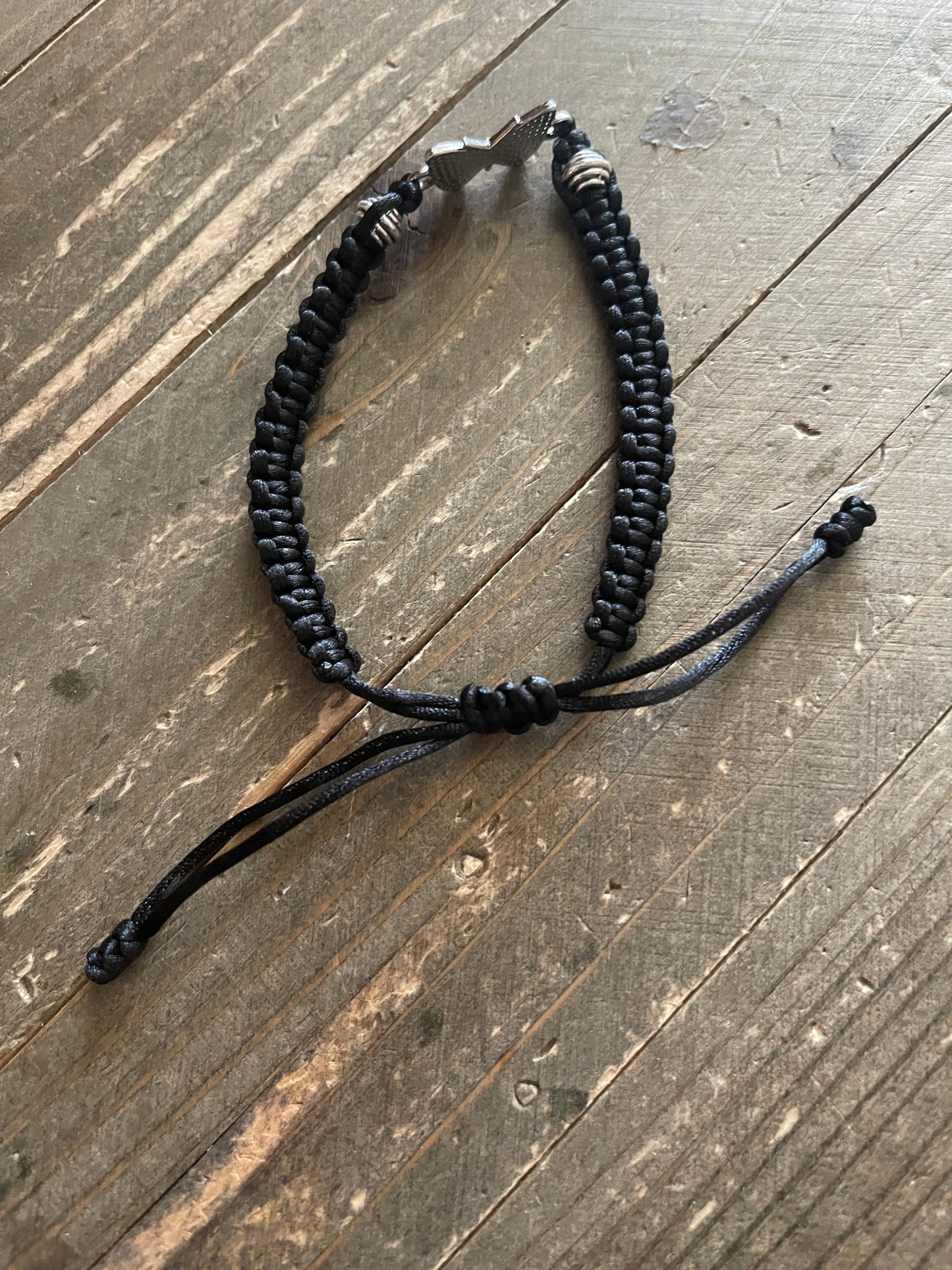 butterfly charm and black braided flat knot braceletPink tiful of LOVE