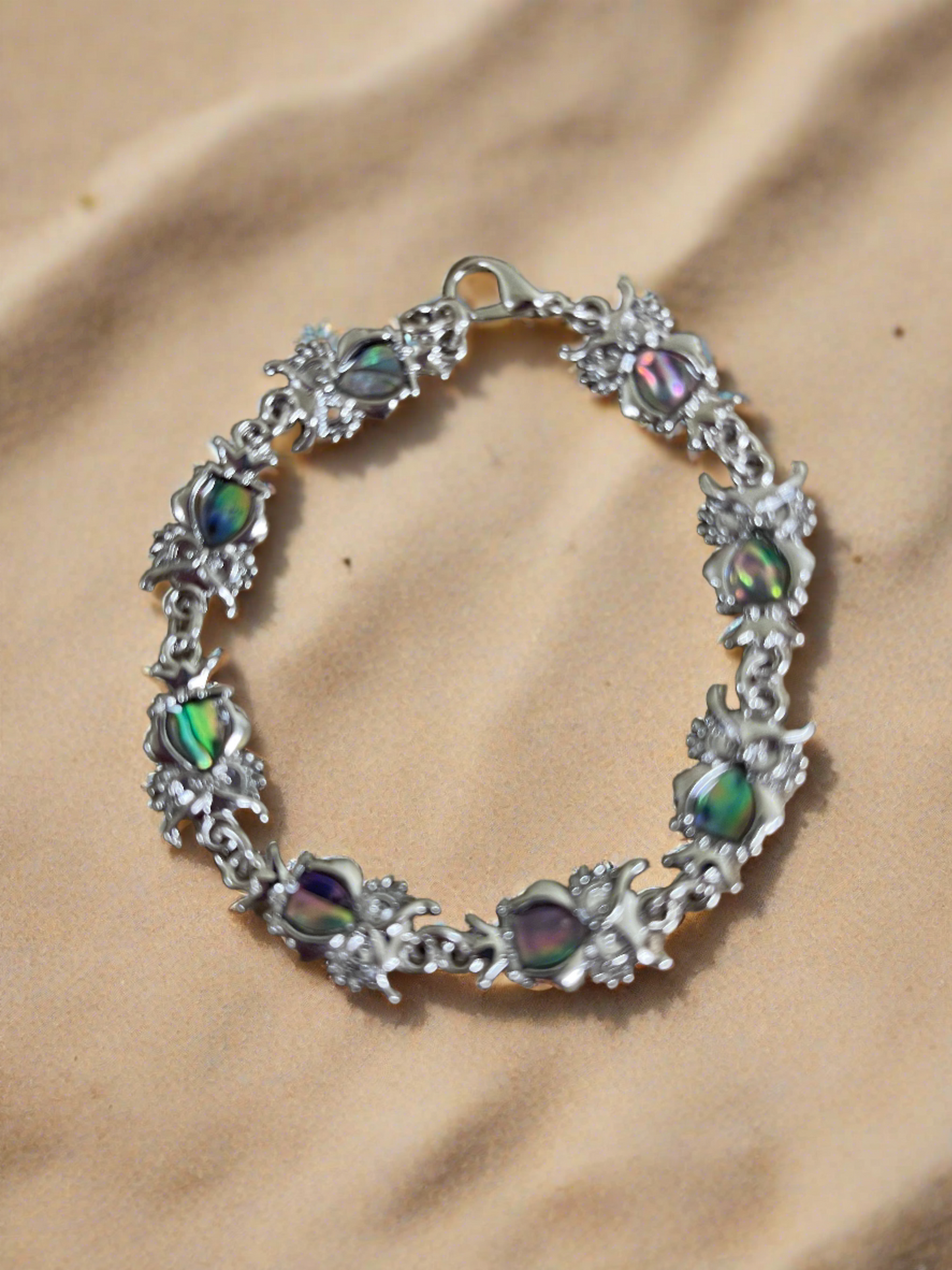 Owl Link Bracelet; combination of shell & metal finish; measuring 7" with 7 owlsPink tiful of LOVE