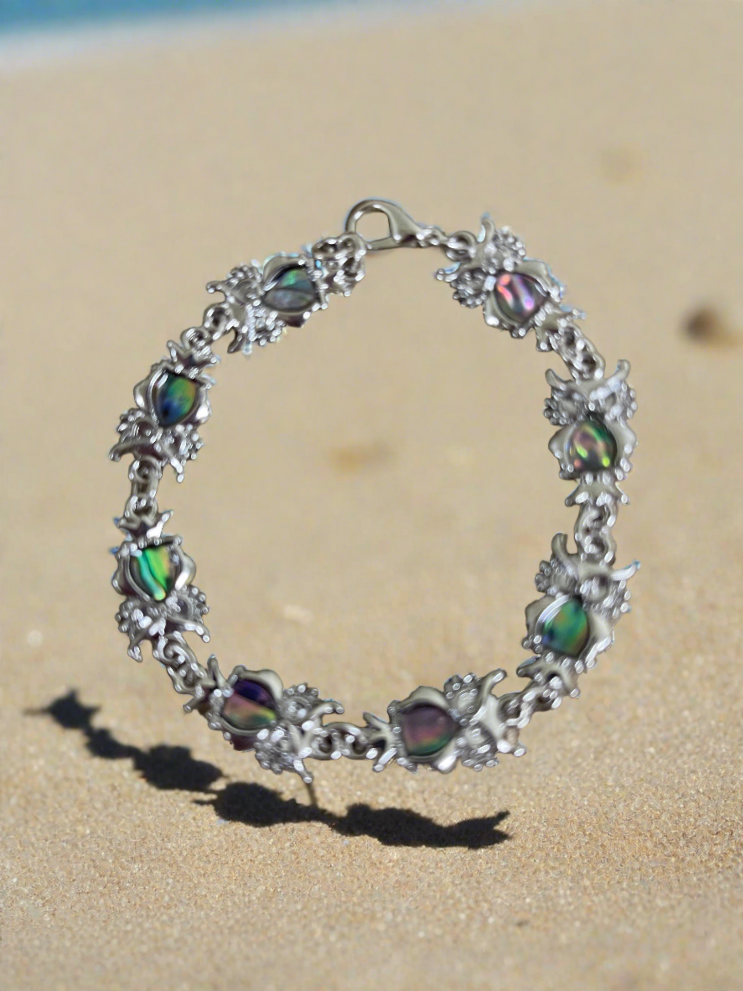 Owl Link Bracelet; combination of shell & metal finish; measuring 7" with 7 owlsPink tiful of LOVE