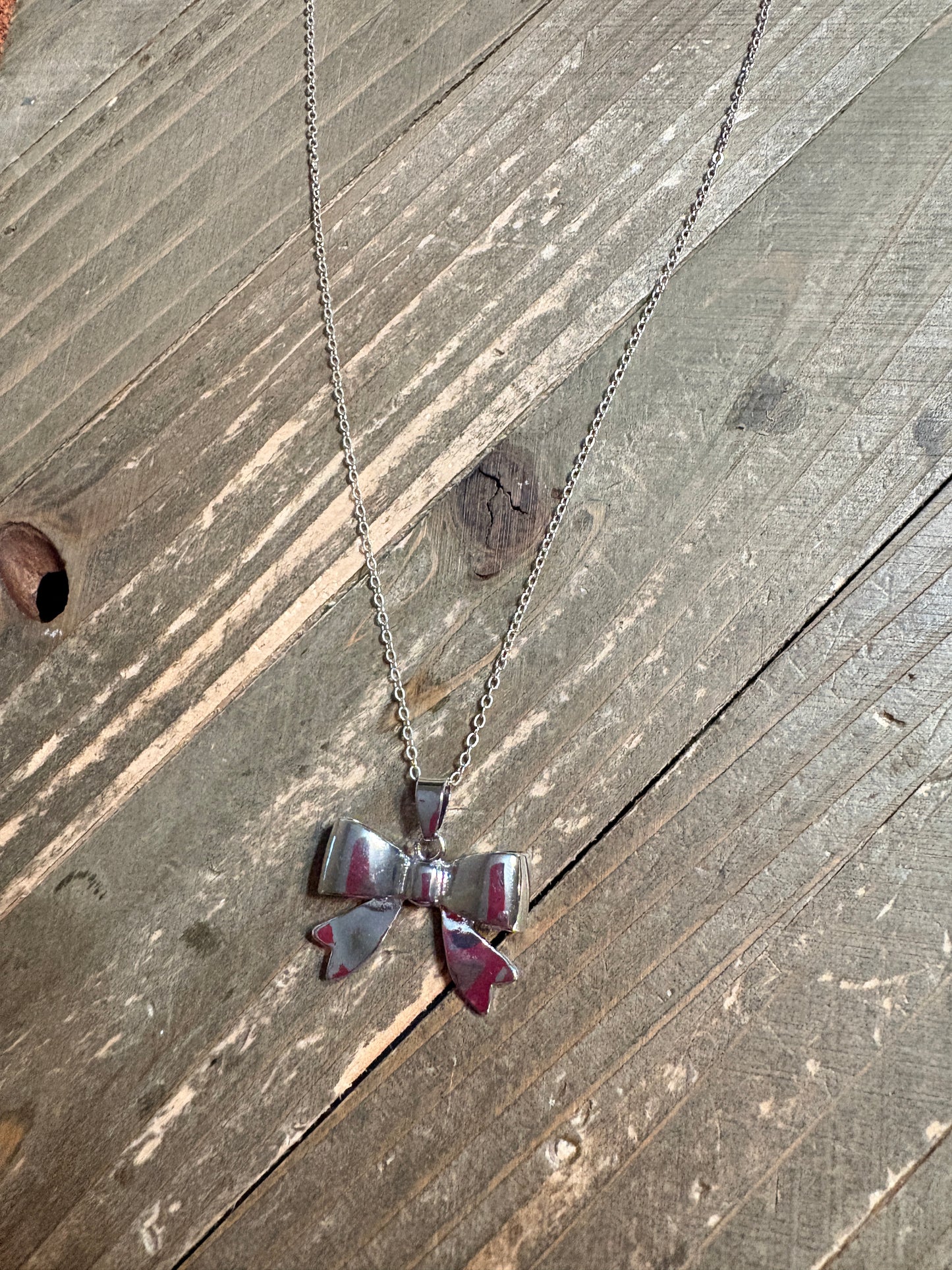 Silver Puff Bow Necklace – Cute Polished Bow Pendant on 16" Silver-Plated Chain