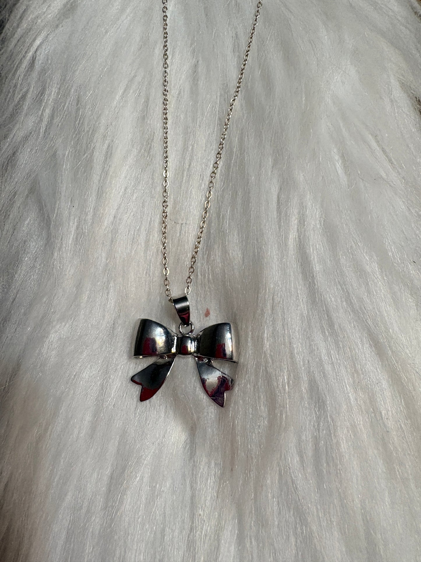 Silver Puff Bow Necklace – Cute Polished Bow Pendant on 16" Silver-Plated Chain