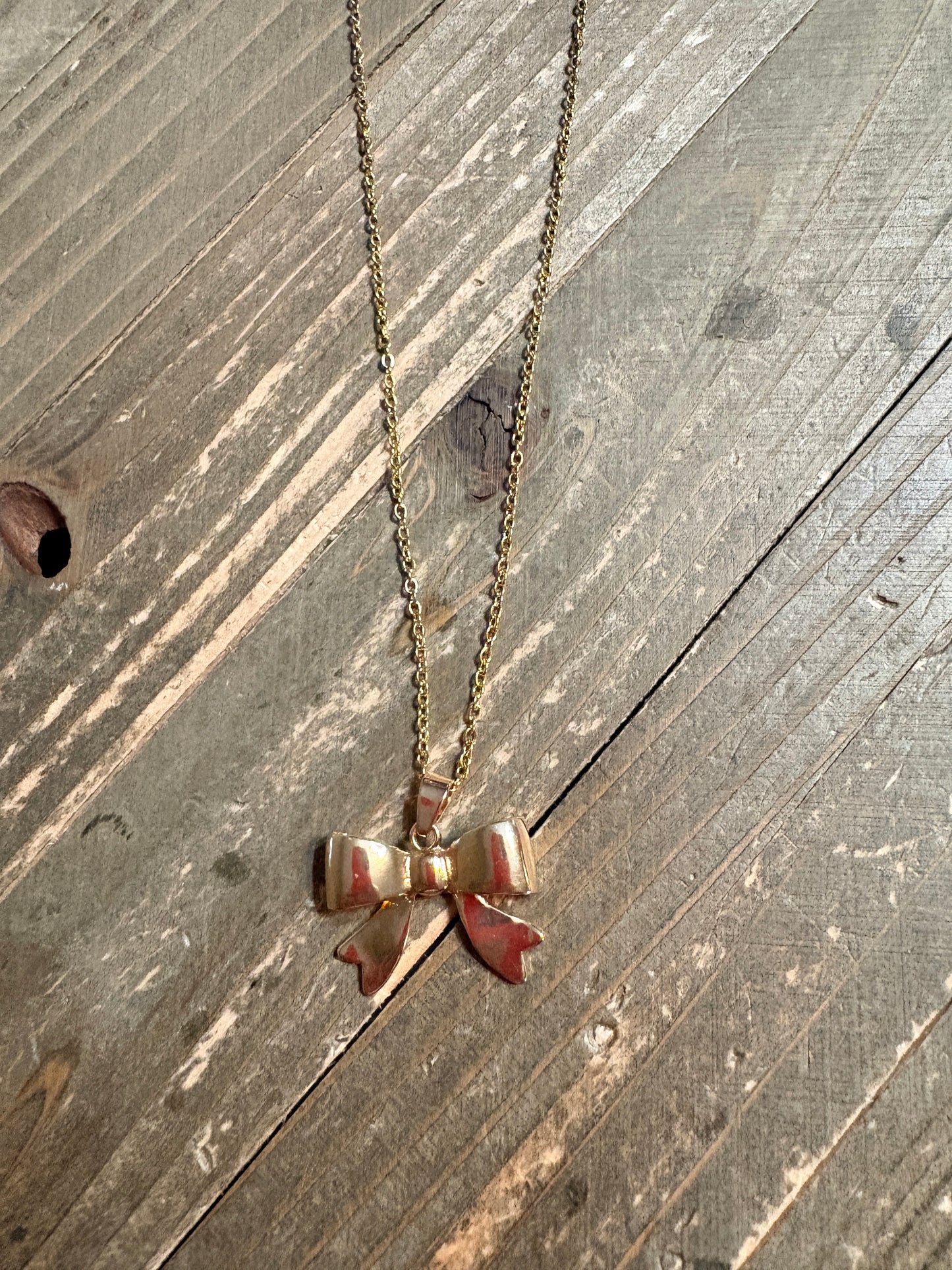 Golden Puff Bow Necklace – Cute Polished Bow Pendant on 16" Gold-Plated Chain