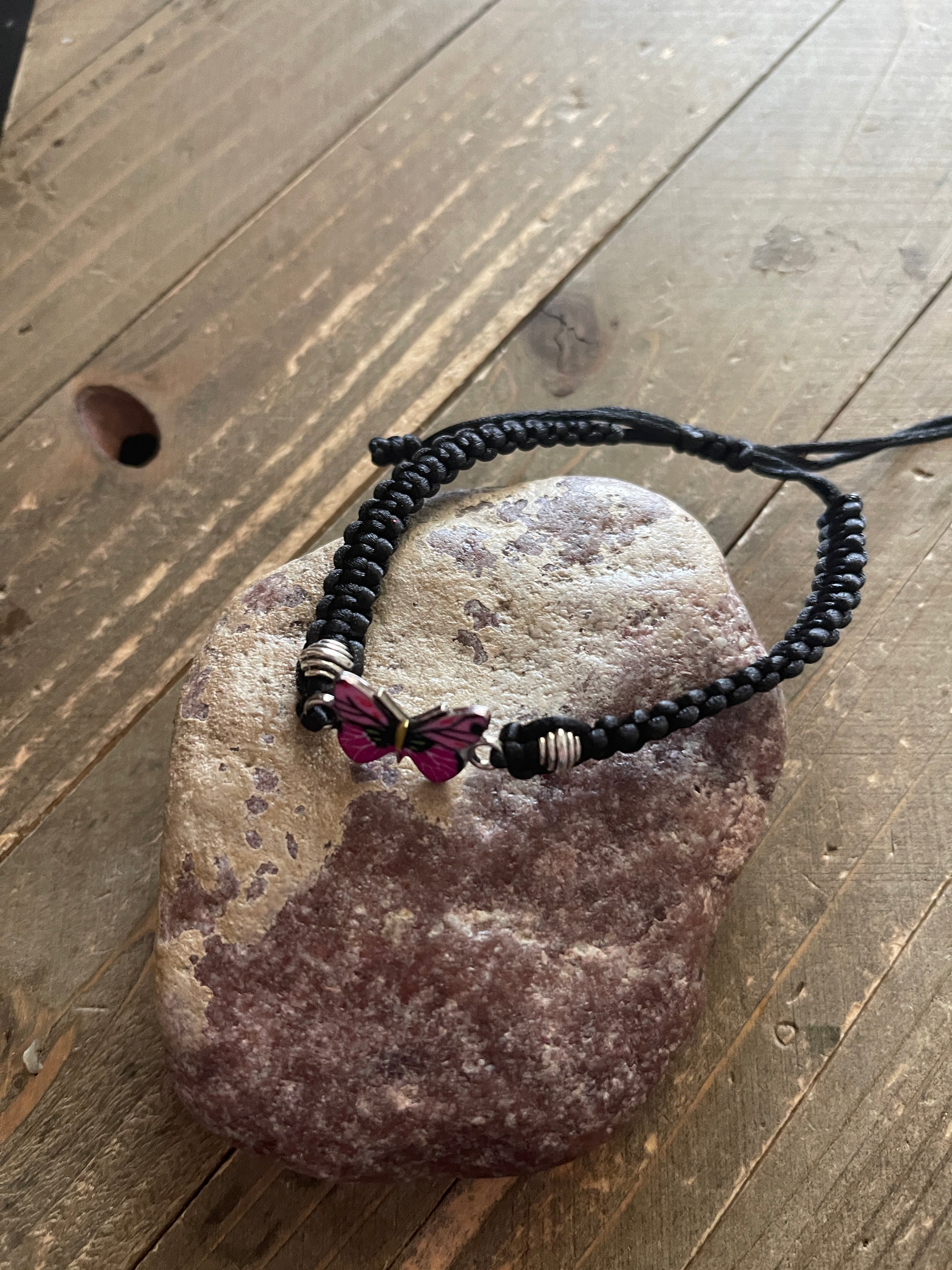 butterfly charm and black braided flat knot braceletPink tiful of LOVE