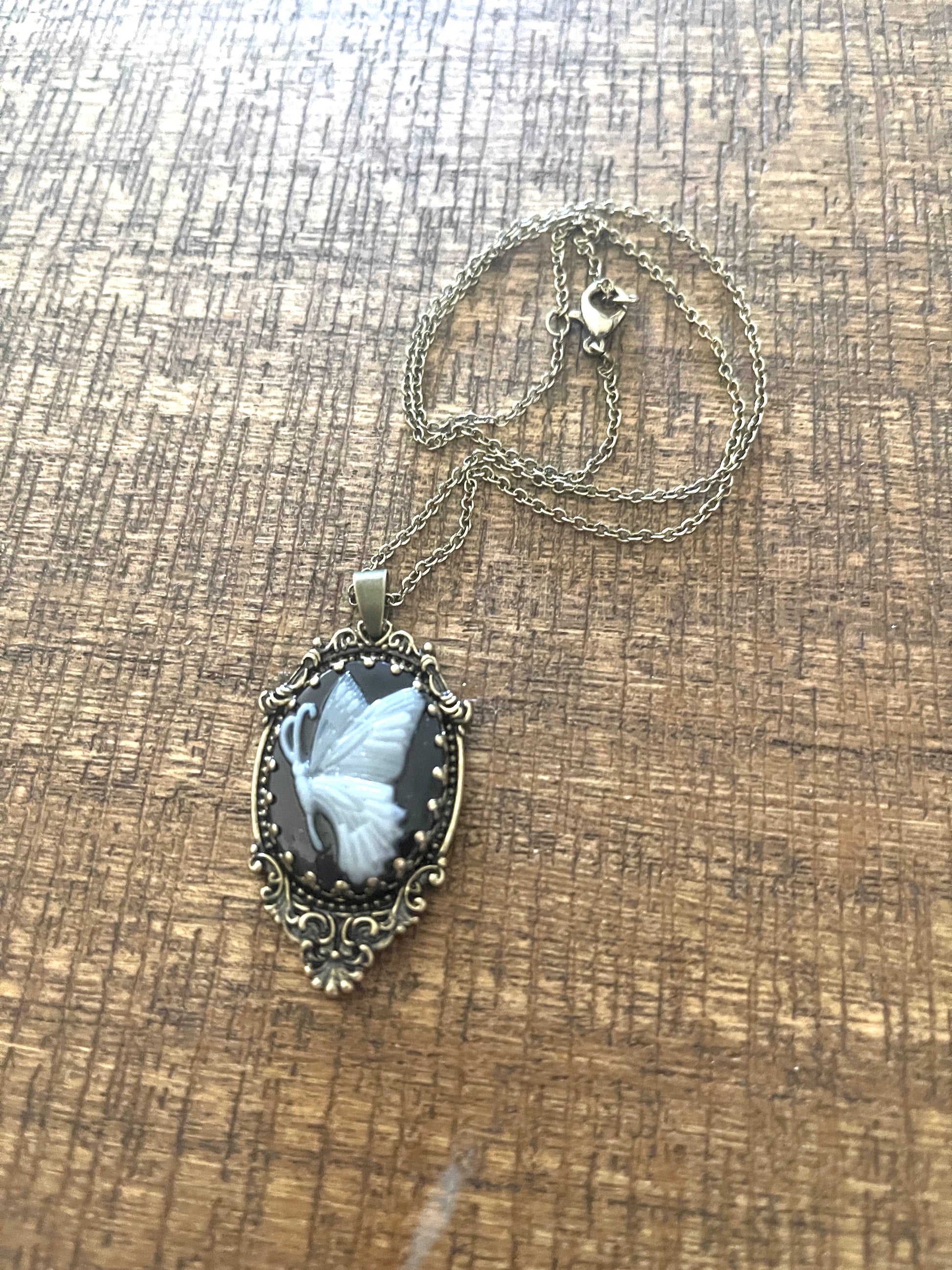 Butterfly Cameo pendant on a bronze Chain NecklacePink tiful of LOVE