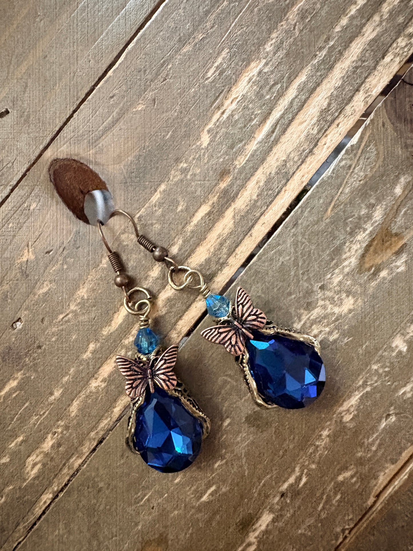 Butterfly Teardrop Glass Charm Dangle Earrings — Sapphire Blue Faceted Stone