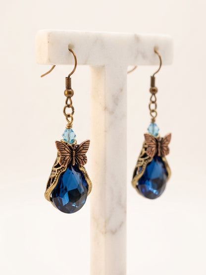 Butterfly Teardrop Glass Charm Dangle Earrings — Sapphire Blue Faceted Stone