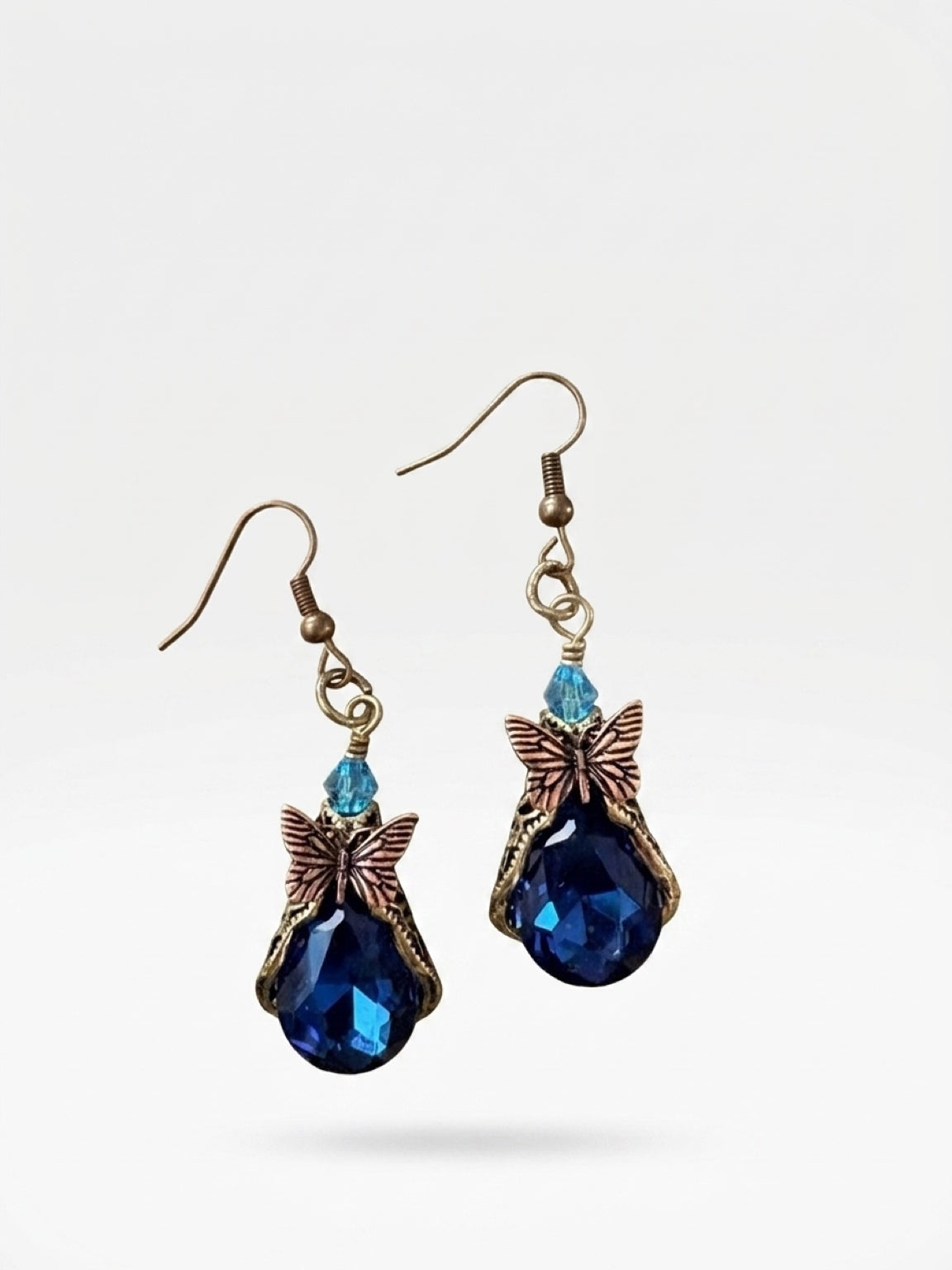 Butterfly Teardrop Glass Charm Dangle Earrings — Sapphire Blue Faceted Stone