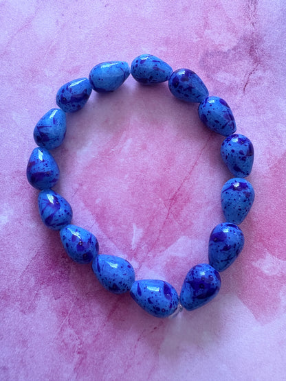 Blue & Purple Splatter Glass Teardrop Beaded Stretch Bracelet — 7"