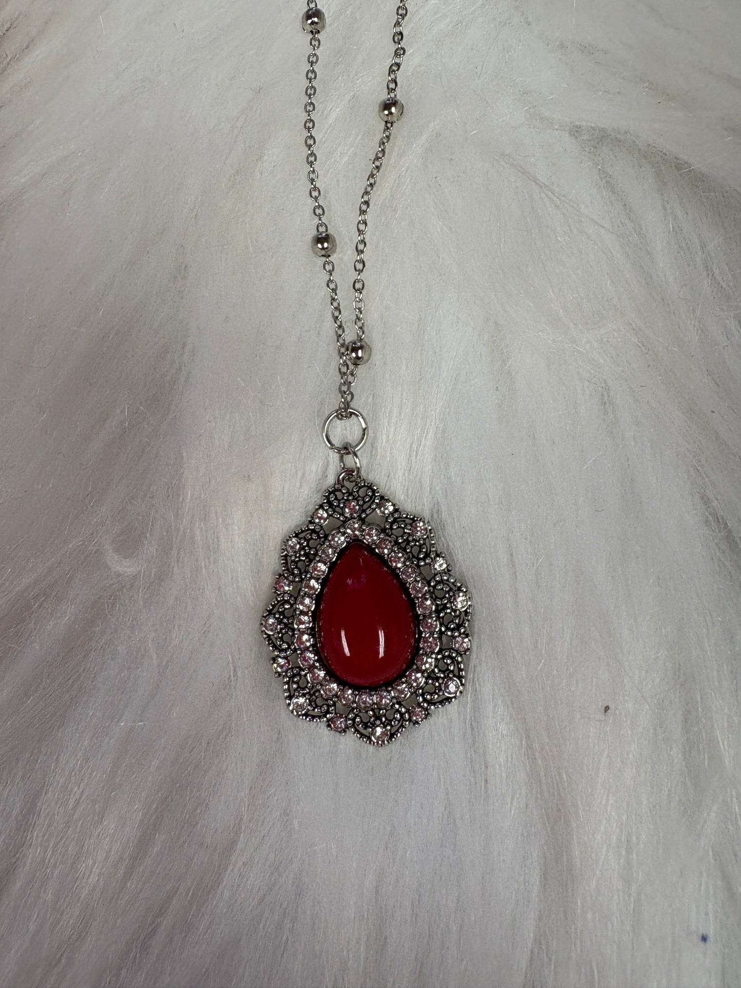 Red Stone Teardrop Pendant on a Silver Chain Necklace