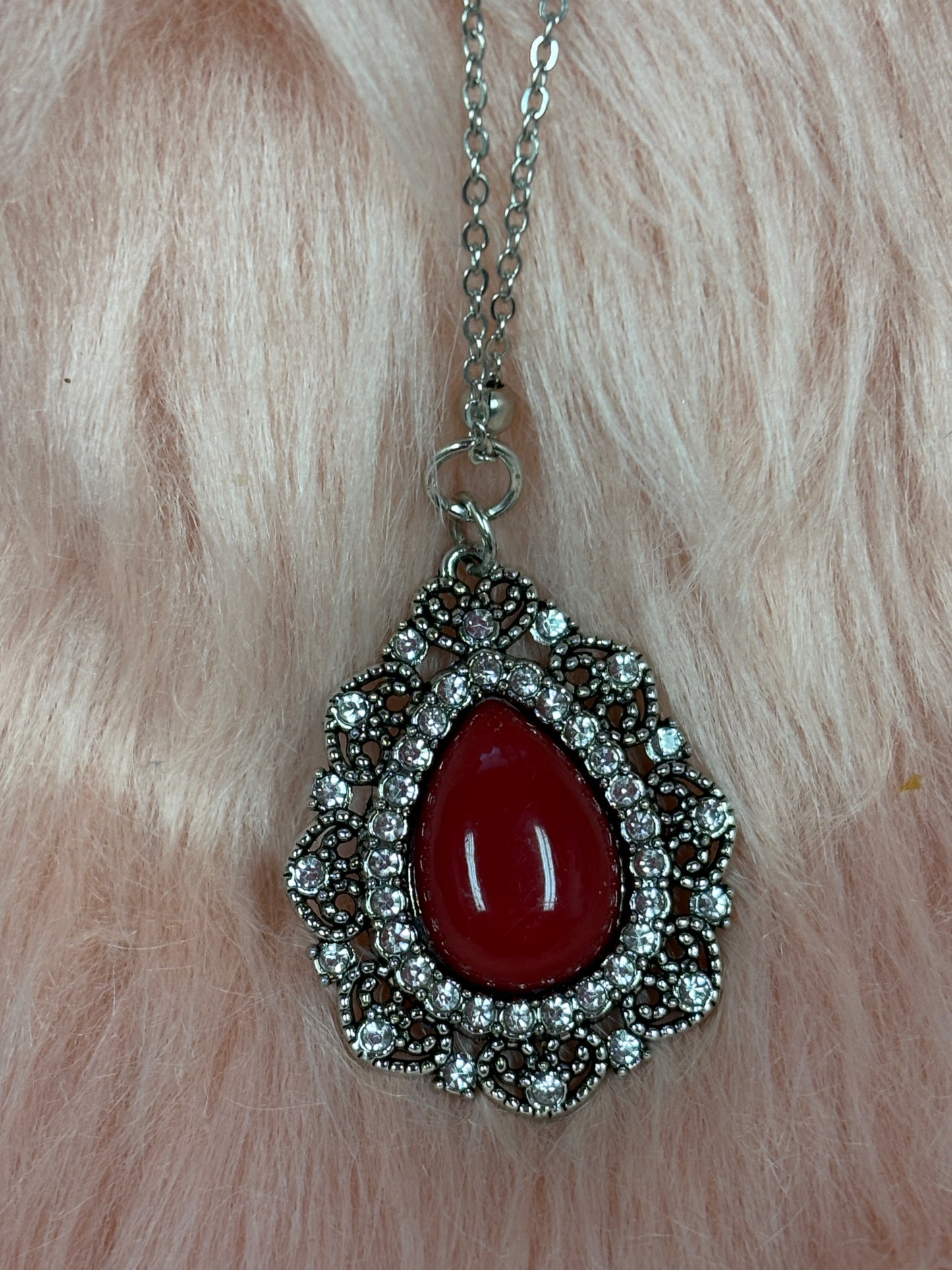 Red Stone Teardrop Pendant on a Silver Chain Necklace