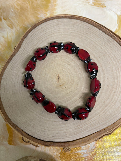 Glass Ladybug Beaded Elastic Bracelet - Add a Whimsical Touch to Your Spring Look - Handcrafted Fashion Jewelry
