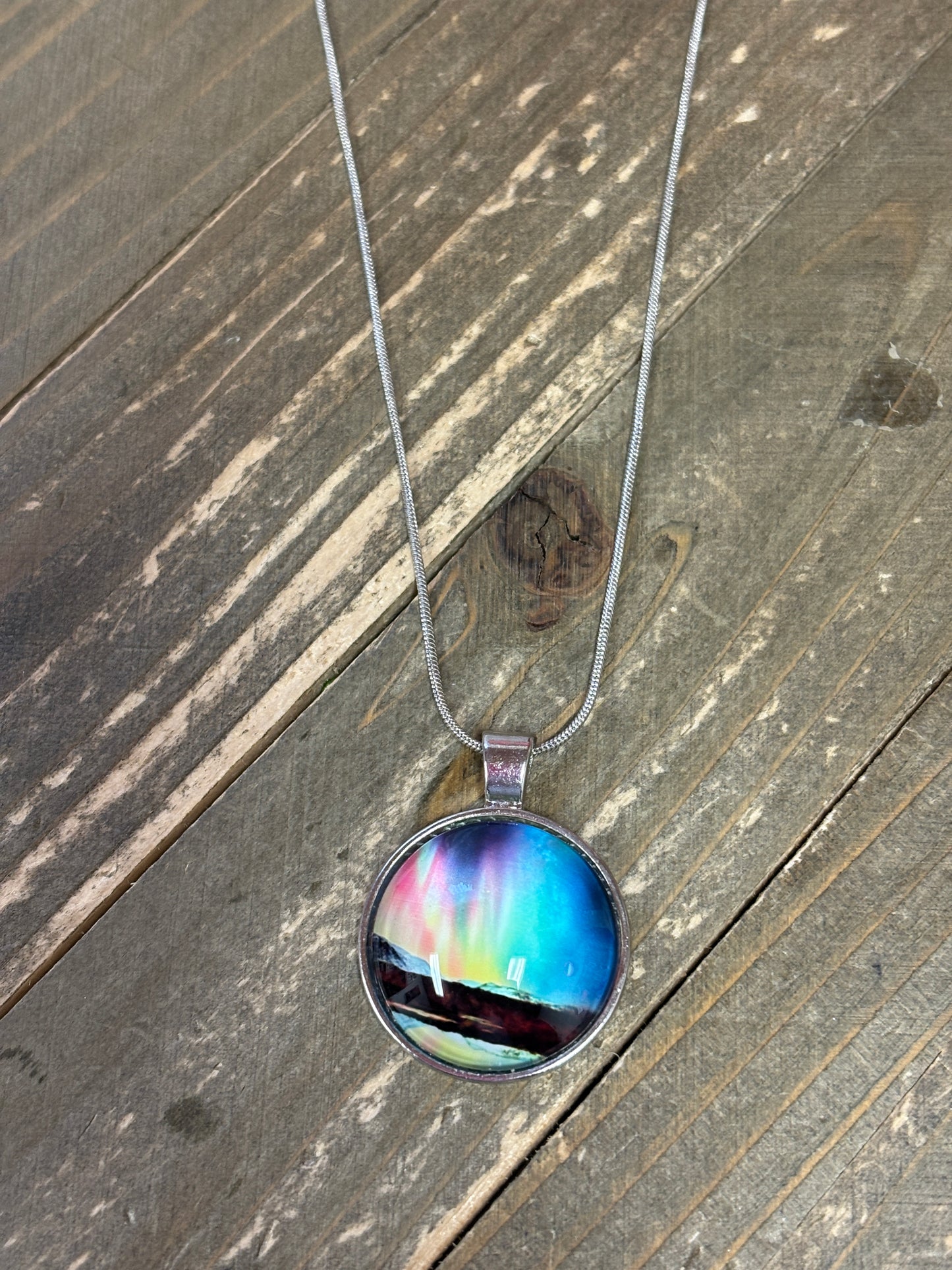 Aurora Lights Cabochon-1 Pendant on a silver Necklace