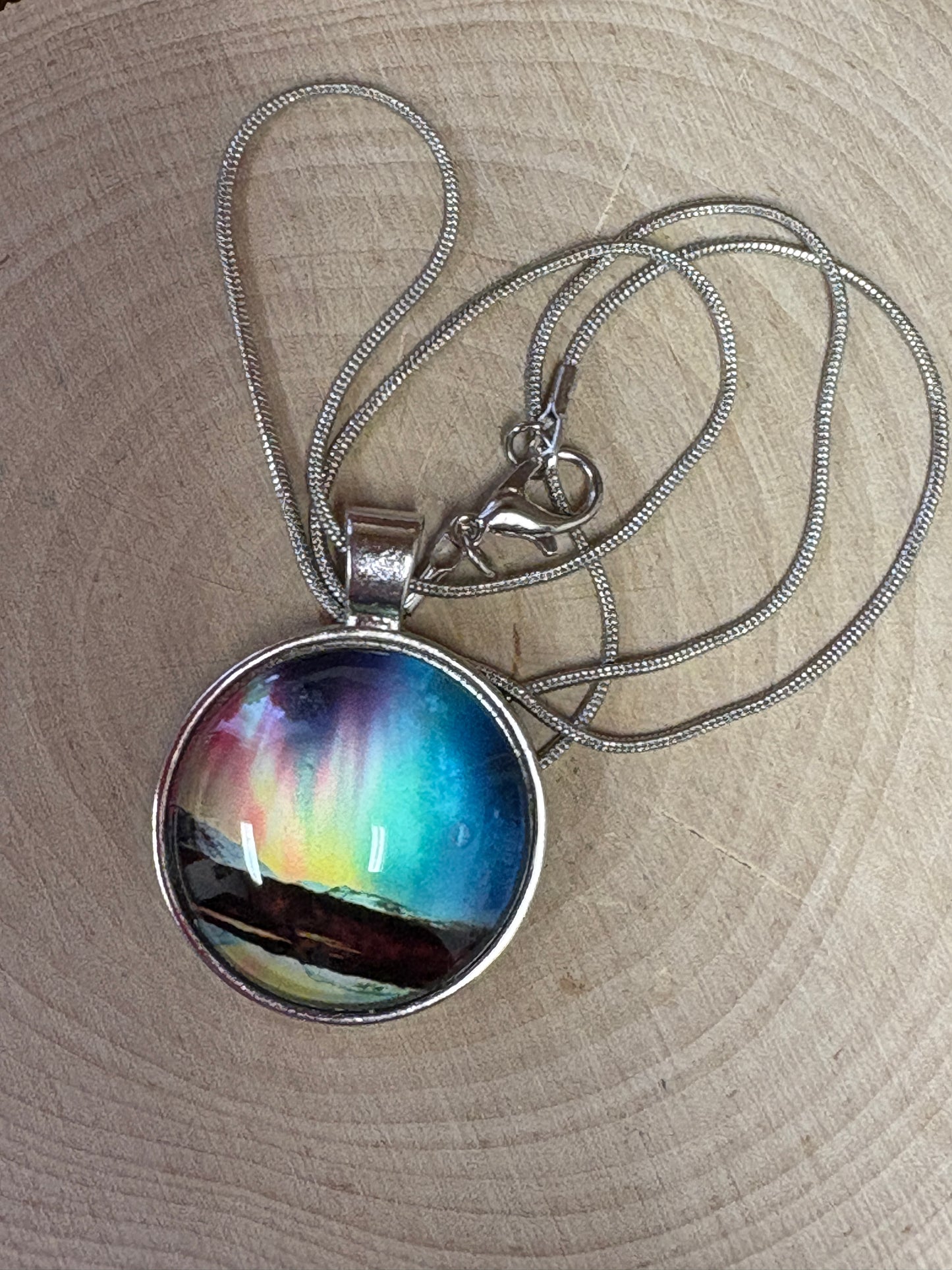 Aurora Lights Cabochon-1 Pendant on a silver Necklace