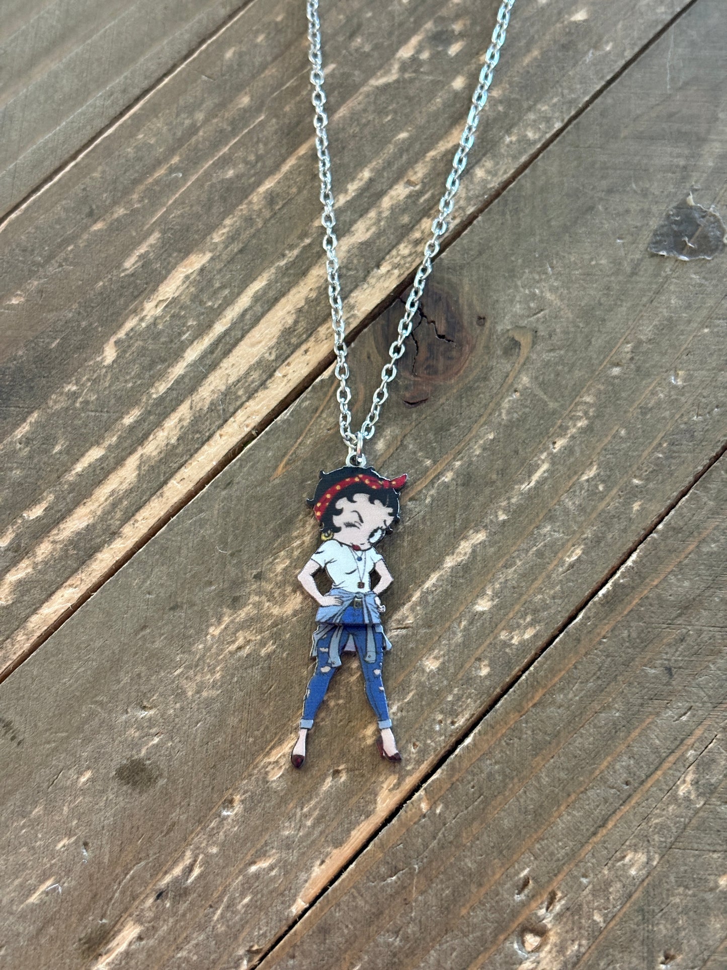 Betty Boop bandana with swinging legs on a silver chain necklace