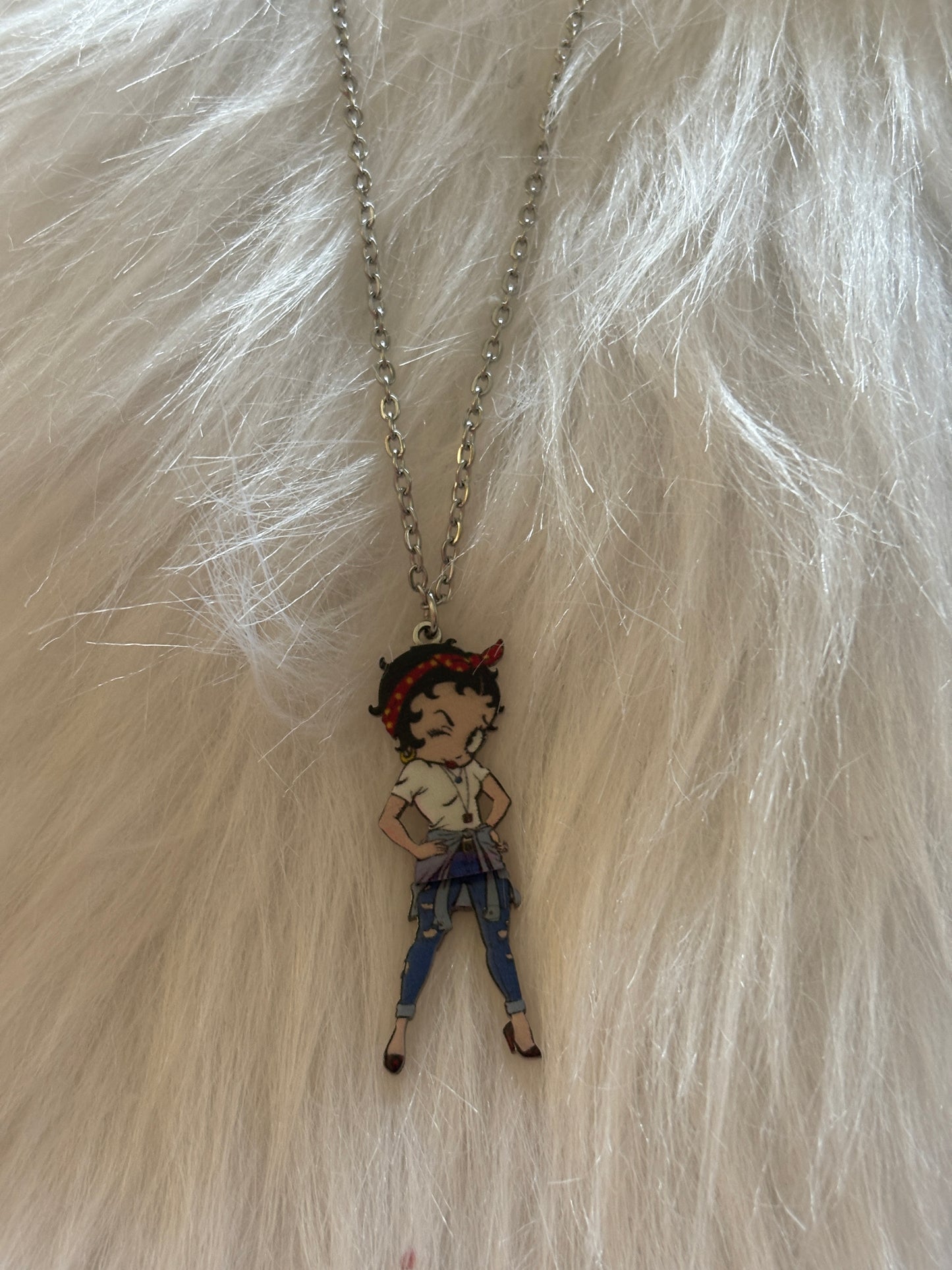 Betty Boop bandana with swinging legs on a silver chain necklace