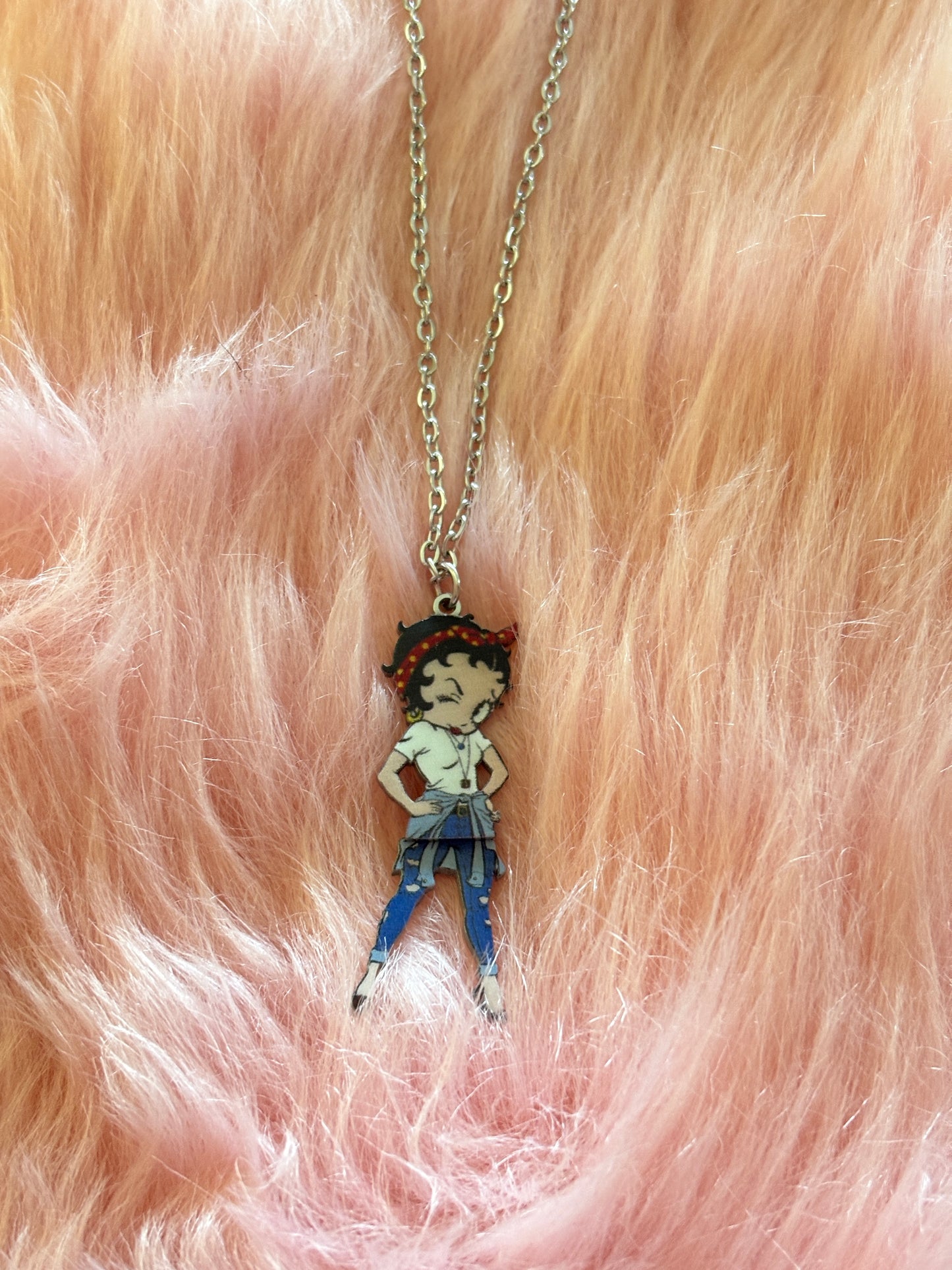 Betty Boop bandana with swinging legs on a silver chain necklace