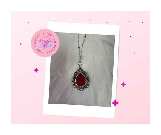 Red Stone Teardrop Pendant on a Silver Chain Necklace