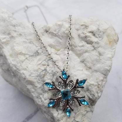 Blue Crystal Snowflake Necklace – Elegant Winter Pendant