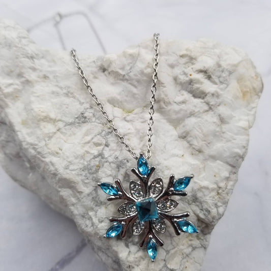 Blue Crystal Snowflake Necklace – Elegant Winter Pendant