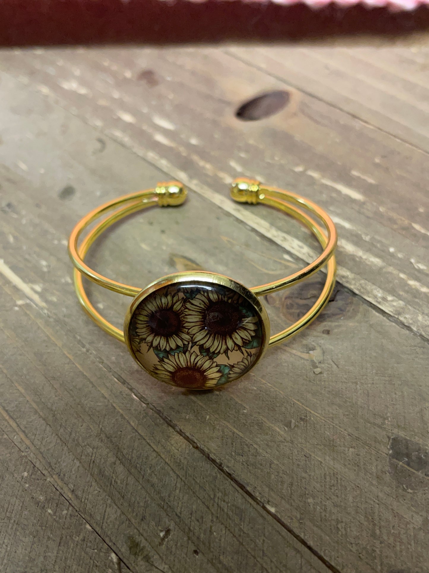 Sunflower bracelet; sunflowers on a Single Gold Cuff BraceletPink tiful of LOVE