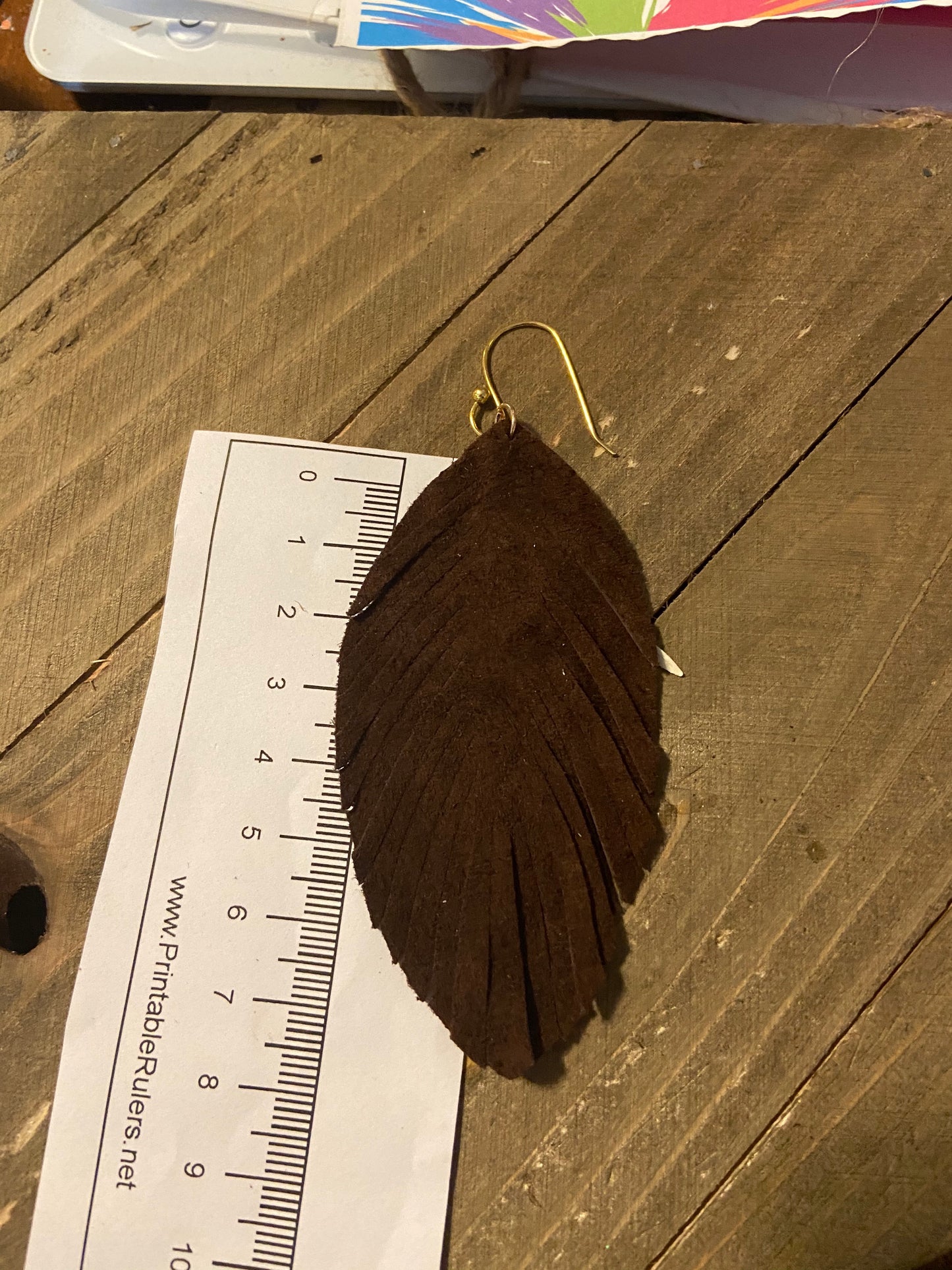 Brown leather leaf drop earrings