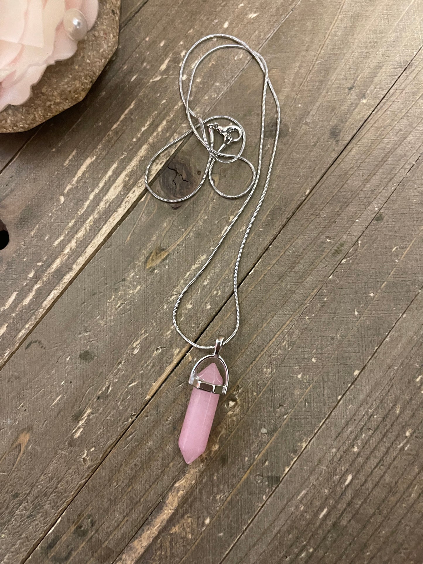 Rose Quartz Crystal Pendant on a Silver chain Necklace